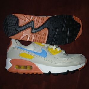 Nike Athletic Shoes in Beige, Blue, and Orange